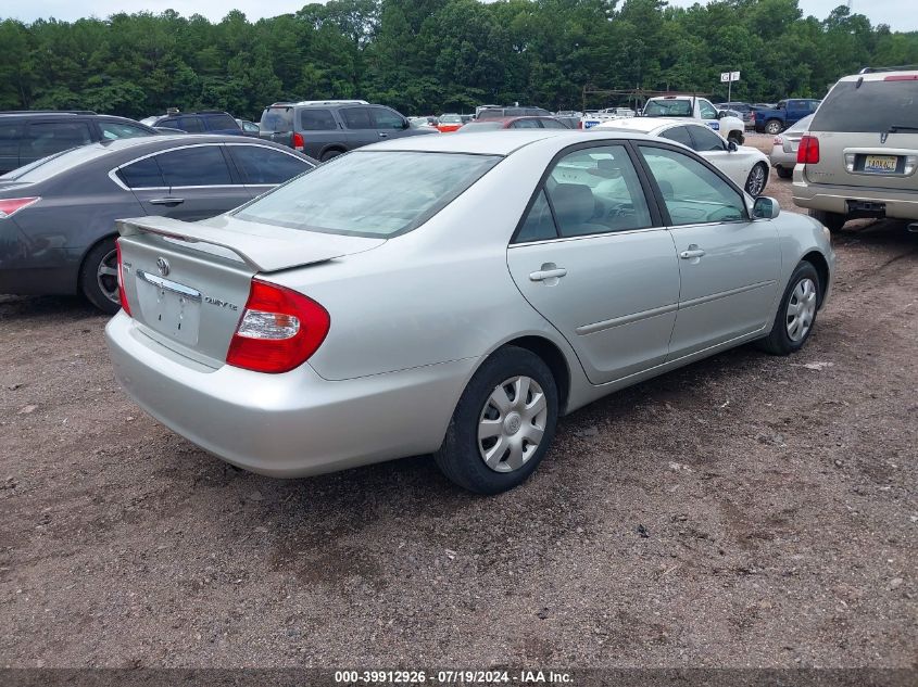 2003 Toyota Camry Le VIN: JTDBE32K330227018 Lot: 39912926