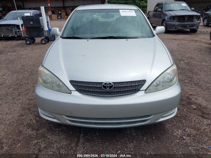 2003 Toyota Camry Le VIN: JTDBE32K330227018 Lot: 39912926