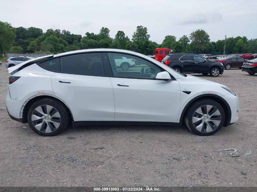 2023 Tesla Model Y Awd/Long Range Dual Motor All-Wheel Drive VIN: 7SAYGAEE3PF755635 Lot: 39913003