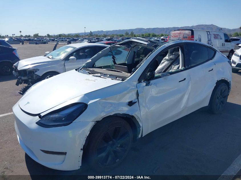 2024 Tesla Model Y Long Range Dual Motor All-Wheel Drive VIN: 7SAYGDEE1RA290824 Lot: 39913774