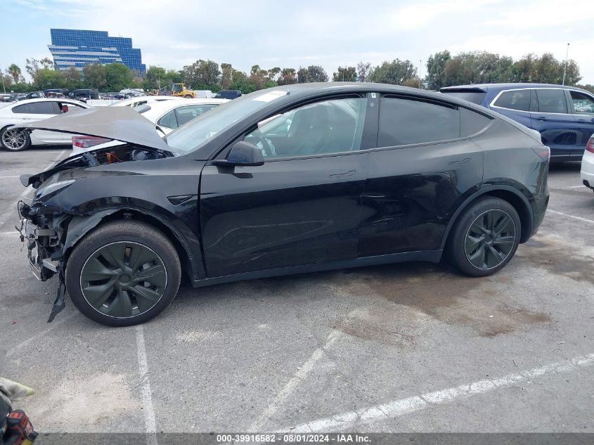 2023 Tesla Model Y Awd/Long Range Dual Motor All-Wheel Drive VIN: 7SAYGAEE0PF618667 Lot: 39916582