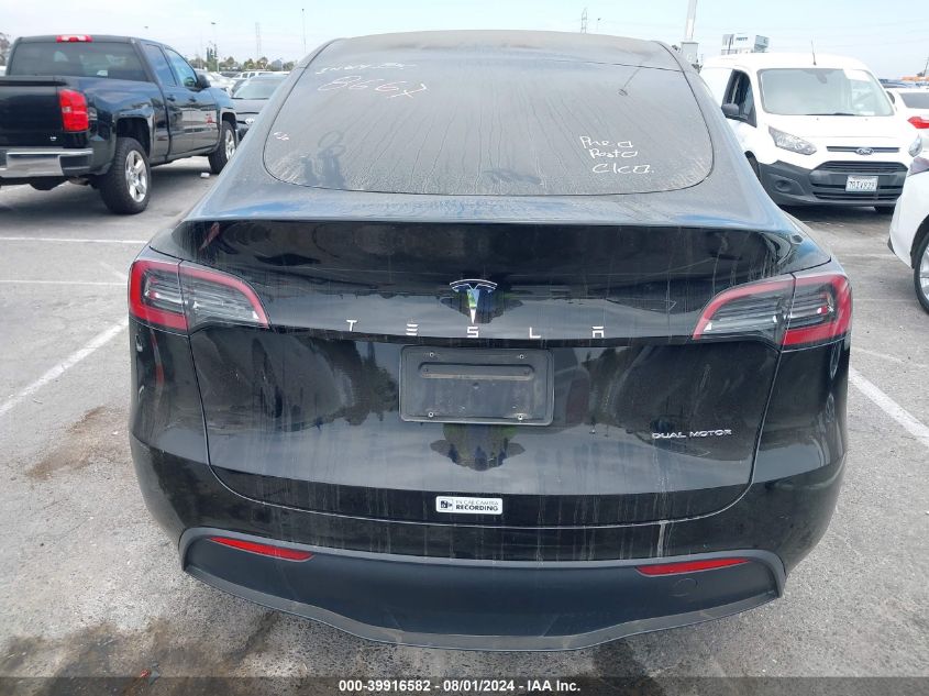 2023 Tesla Model Y Awd/Long Range Dual Motor All-Wheel Drive VIN: 7SAYGAEE0PF618667 Lot: 39916582