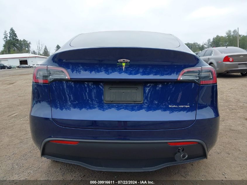 2023 Tesla Model Y Awd/Long Range Dual Motor All-Wheel Drive VIN: 7SAYGDEE4PF694376 Lot: 39916611