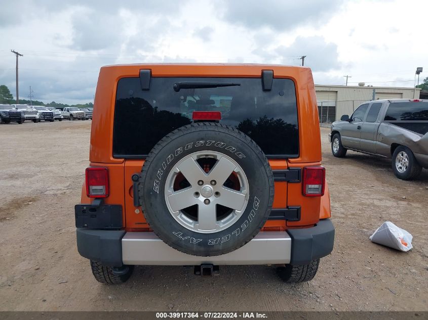 2011 Jeep Wrangler Sahara VIN: 1J4AA5D18BL546235 Lot: 39917364