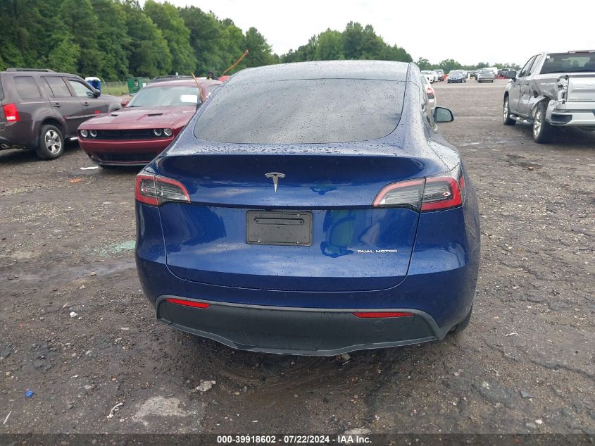 2023 Tesla Model Y Awd/Long Range Dual Motor All-Wheel Drive VIN: 7SAYGDEE4PF748114 Lot: 39918602