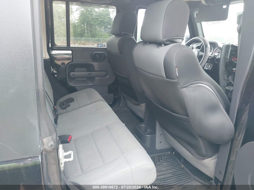 2007 Jeep Wrangler Unlimited Sahara VIN: 1J8GA59177L197173 Lot: 39918672