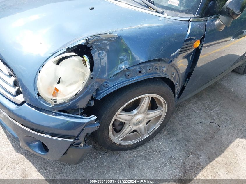 2009 Mini Cooper VIN: WMWMF335X9TU73566 Lot: 39919391