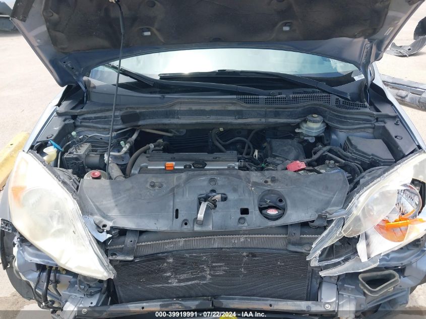 2007 Honda Cr-V Lx VIN: JHLRE38397C021174 Lot: 39919991