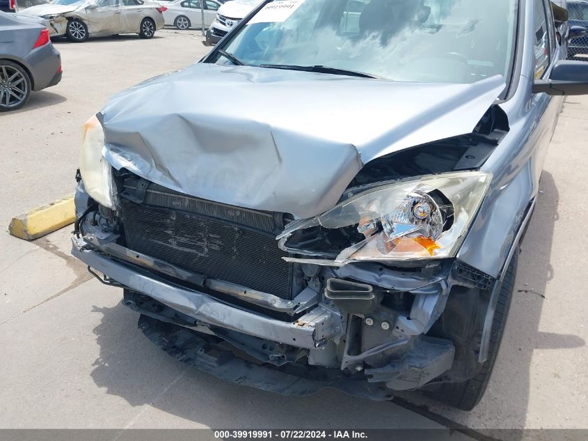 2007 Honda Cr-V Lx VIN: JHLRE38397C021174 Lot: 39919991