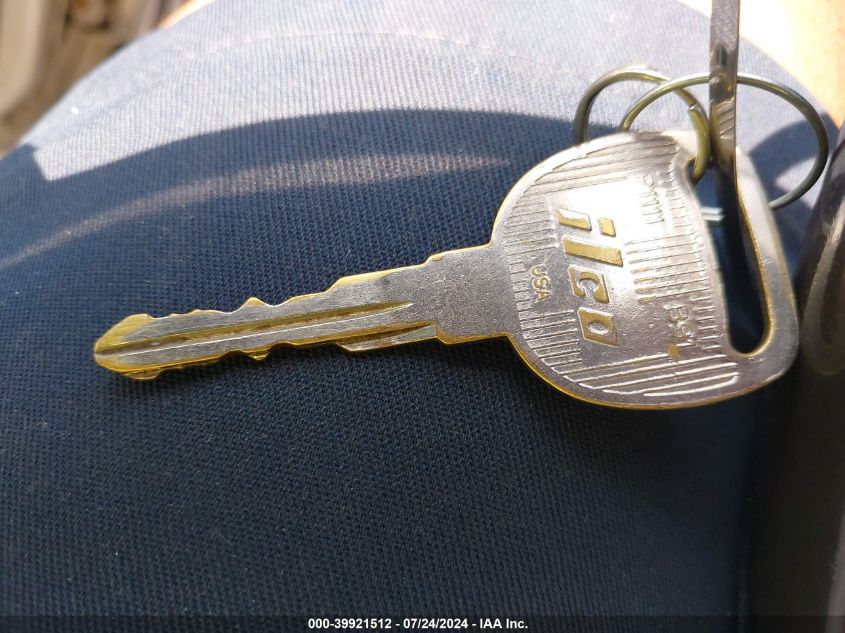 2004 Chevrolet Tahoe Lt VIN: 1GNEK13T04J267559 Lot: 39921512