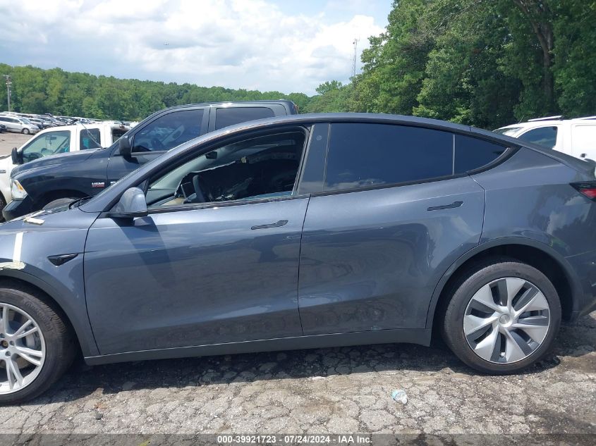 2023 Tesla Model Y Awd/Long Range Dual Motor All-Wheel Drive VIN: 7SAYGDEE9PA037523 Lot: 39921723