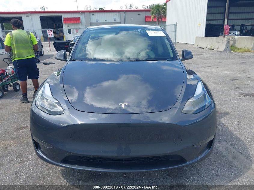 2023 Tesla Model Y Awd/Long Range Dual Motor All-Wheel Drive VIN: 7SAYGDEE7PA208267 Lot: 39922019