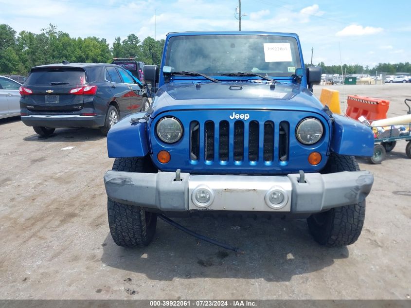 2010 Jeep Wrangler Unlimited Sahara VIN: 1J4HA5H14AL103393 Lot: 39922061