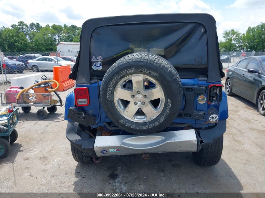 2010 Jeep Wrangler Unlimited Sahara VIN: 1J4HA5H14AL103393 Lot: 39922061