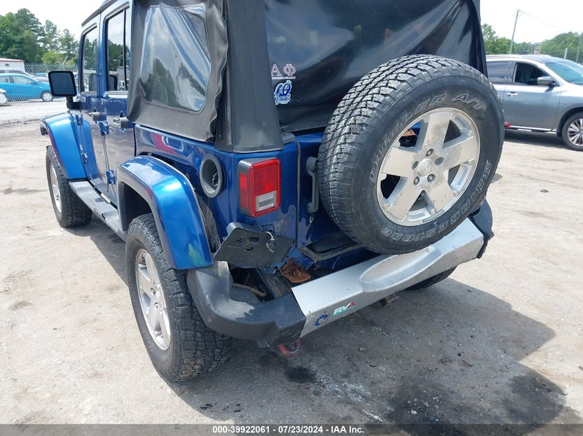 2010 Jeep Wrangler Unlimited Sahara VIN: 1J4HA5H14AL103393 Lot: 39922061