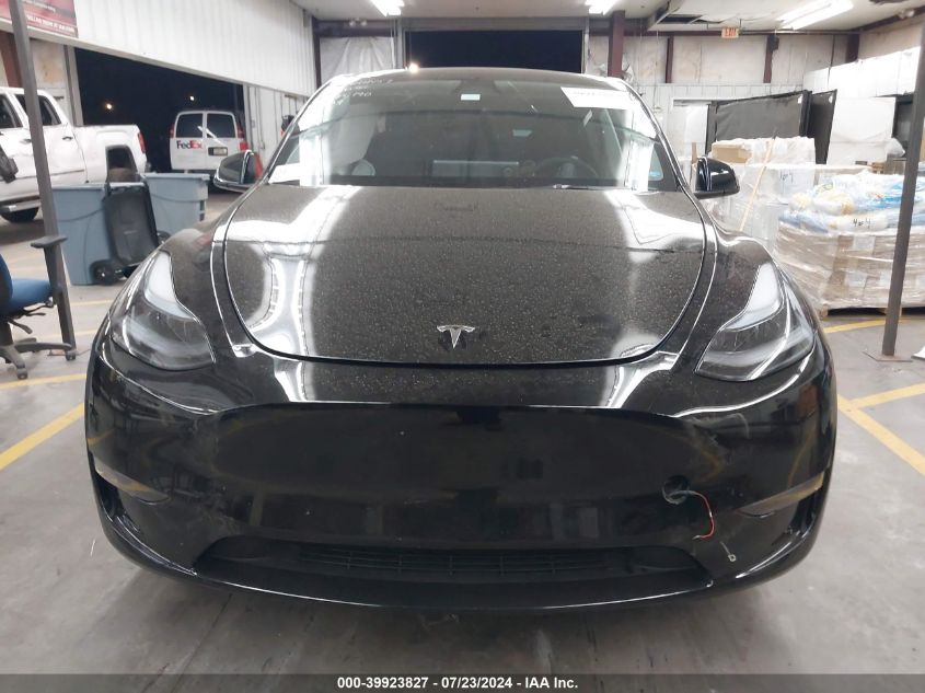 2023 Tesla Model Y Awd/Long Range Dual Motor All-Wheel Drive VIN: 7SAYGAEE4PF891059 Lot: 39923827