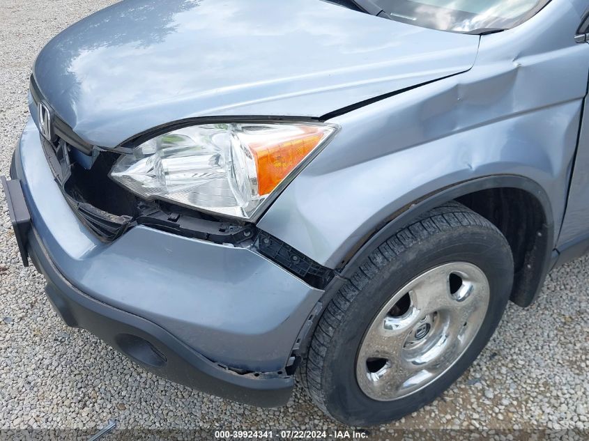 2007 Honda Cr-V Lx VIN: 5J6RE38367L000595 Lot: 39924341