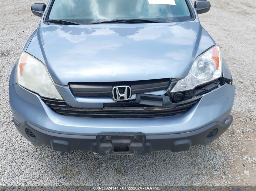 2007 Honda Cr-V Lx VIN: 5J6RE38367L000595 Lot: 39924341