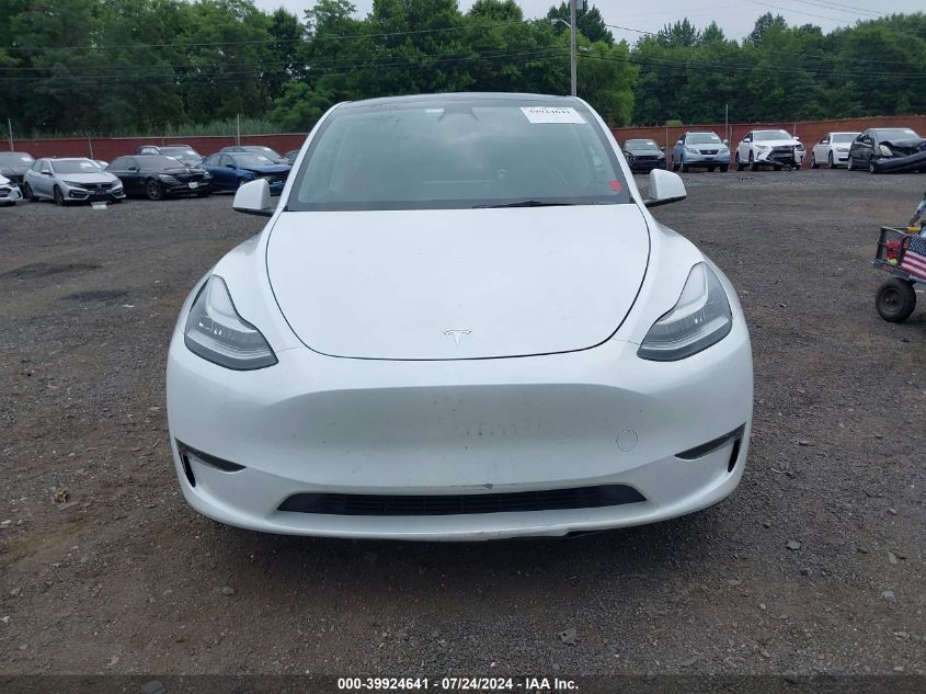 2023 Tesla Model Y Awd/Long Range Dual Motor All-Wheel Drive VIN: 7SAYGDEE7PA054465 Lot: 39924641