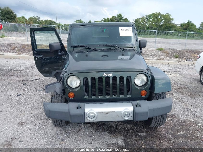 2011 Jeep Wrangler Unlimited Sahara VIN: 1J4BA5H15BL557529 Lot: 39925136