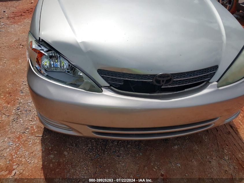 2003 Toyota Camry Le VIN: 4T1BE32KX3U662011 Lot: 39925283