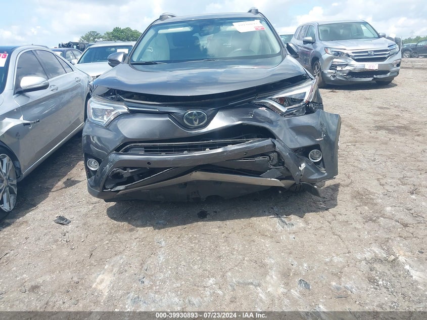 2018 TOYOTA RAV4 LIMITED - JTMYFREV1JJ204036