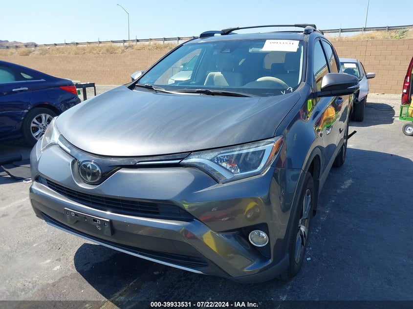 VIN JTMWFREV1JD116965 2018 TOYOTA RAV4 XLE