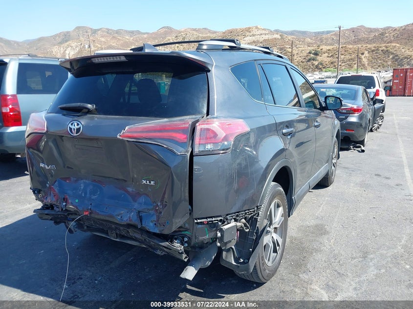VIN JTMWFREV1JD116965 2018 TOYOTA RAV4 XLE