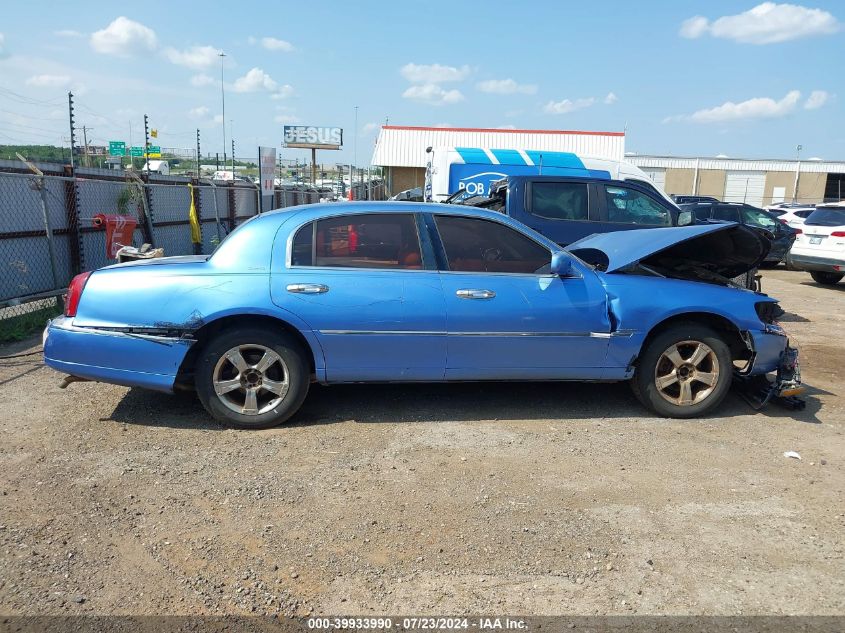 1999 Lincoln Town Car Executive VIN: 1LNHM81W3XY713054 Lot: 39933990