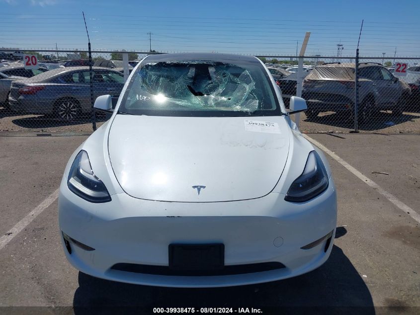 2024 Tesla Model Y Long Range/Rwd VIN: 7SAYGDED4RF093754 Lot: 39938475