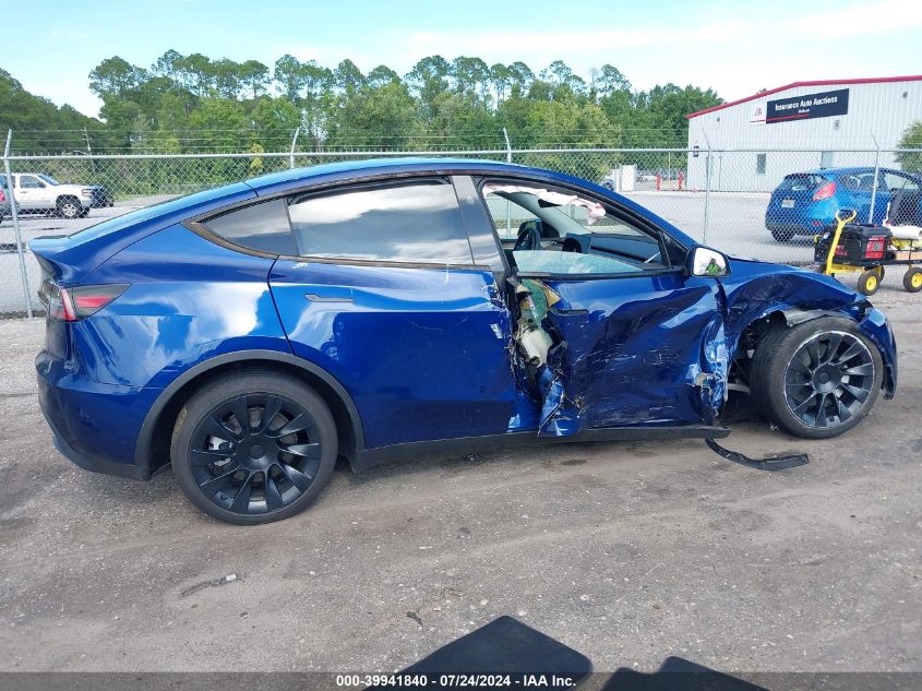 2023 Tesla Model Y Awd/Long Range Dual Motor All-Wheel Drive VIN: 7SAYGDEE0PA135422 Lot: 39941840