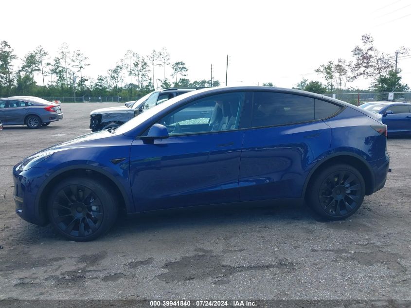 2023 Tesla Model Y Awd/Long Range Dual Motor All-Wheel Drive VIN: 7SAYGDEE0PA135422 Lot: 39941840