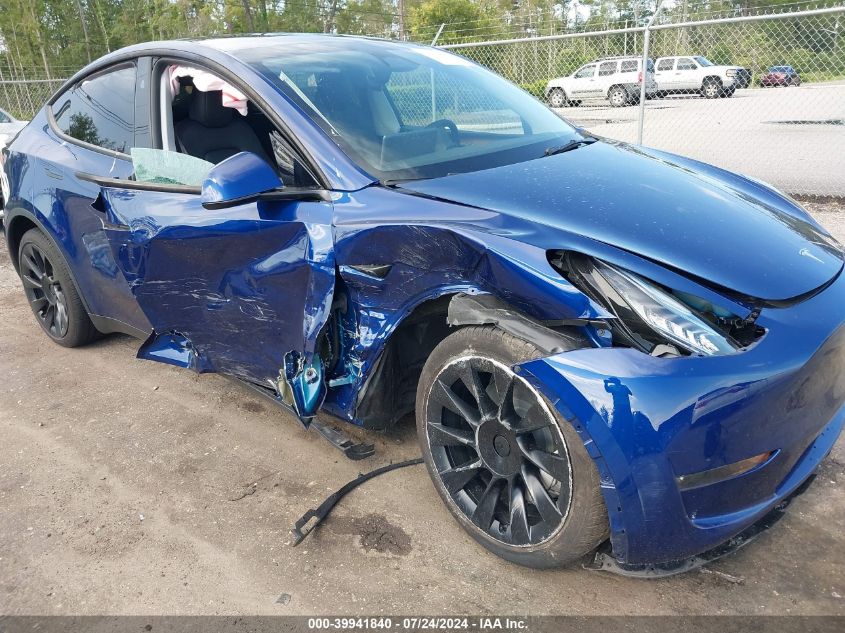 2023 Tesla Model Y Awd/Long Range Dual Motor All-Wheel Drive VIN: 7SAYGDEE0PA135422 Lot: 39941840