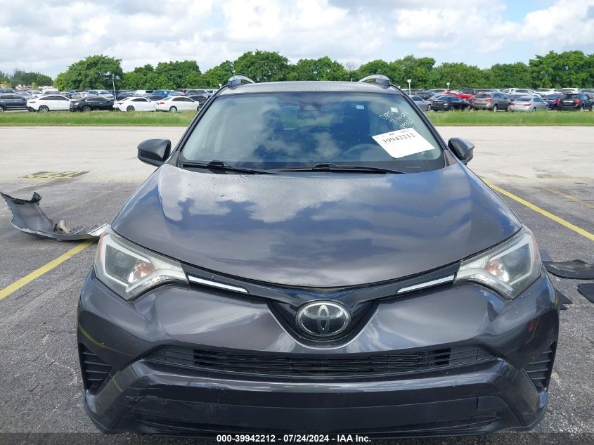 2018 Toyota Rav4 Le VIN: JTMZFREVXJJ189380 Lot: 39942212