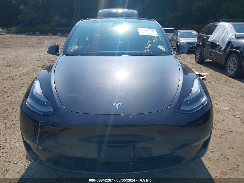 2024 Tesla Model Y Long Range Dual Motor All-Wheel Drive VIN: 7SAYGDEE4RA271152 Lot: 39942267