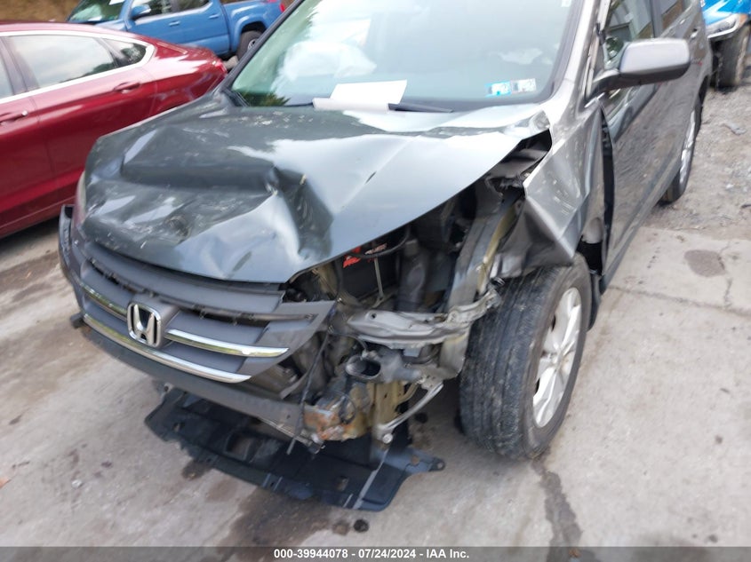 2013 Honda Cr-V Exl VIN: 2HKRM4H73DH662104 Lot: 39944078