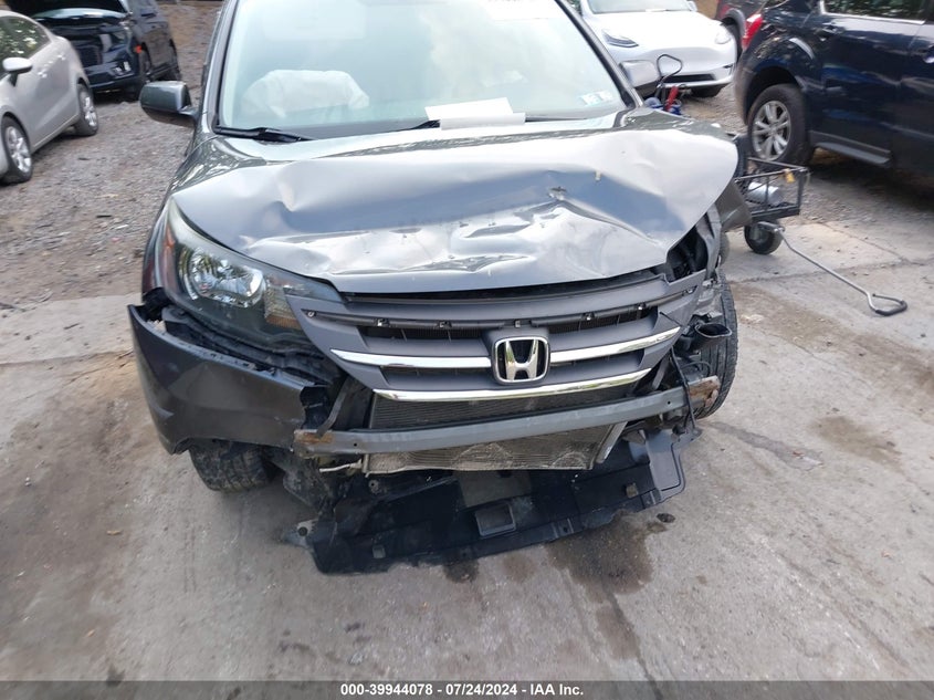 2013 Honda Cr-V Exl VIN: 2HKRM4H73DH662104 Lot: 39944078