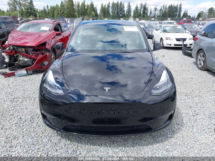 2023 Tesla Model Y Awd/Long Range Dual Motor All-Wheel Drive VIN: 7SAYGDEE3PF967842 Lot: 39944524