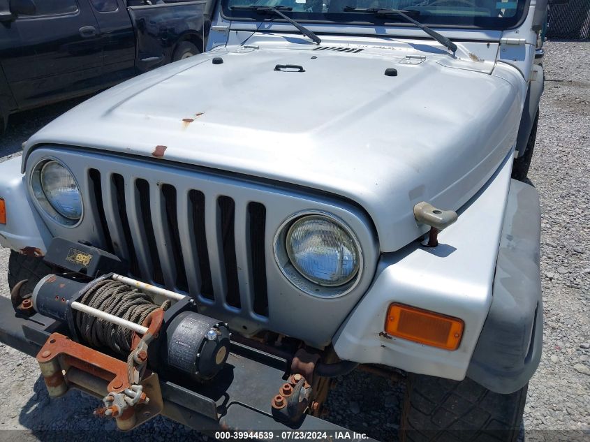 2004 Jeep Wrangler Se VIN: 1J4FA29154P702398 Lot: 39944539