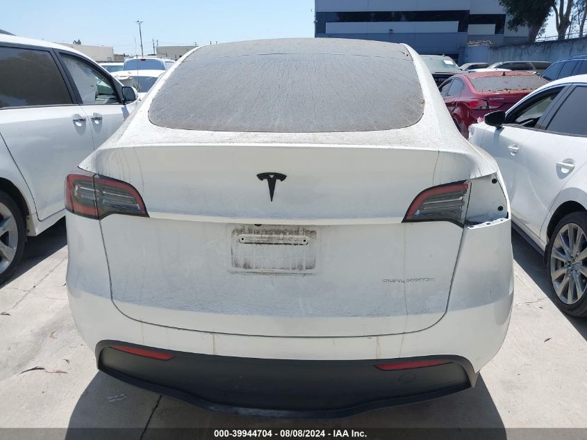 2023 Tesla Model Y Awd/Long Range Dual Motor All-Wheel Drive VIN: 7SAYGDEE9PA118747 Lot: 39944704