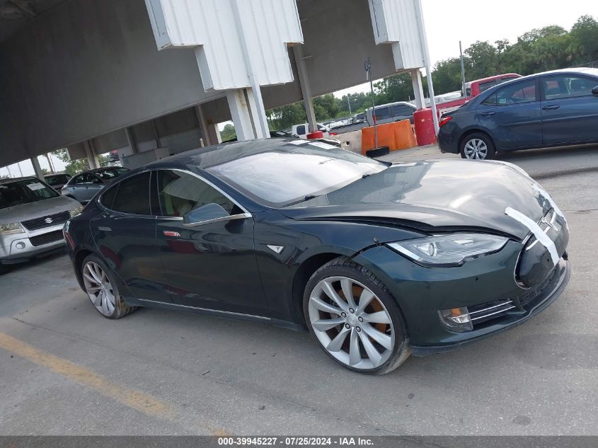 2014 Tesla Model S VIN: 5YJSA1H1XEFP49843 Lot: 39945227