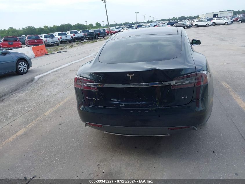 2014 Tesla Model S VIN: 5YJSA1H1XEFP49843 Lot: 39945227