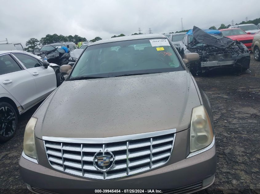 2007 Cadillac Dts V8 VIN: 1G6KD57Y07U131943 Lot: 39945454