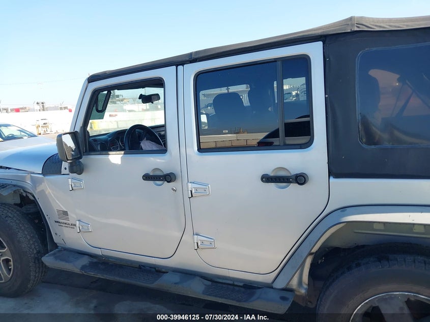 2007 Jeep Wrangler Unlimited Sahara VIN: 1J4GB59107L184215 Lot: 39946125