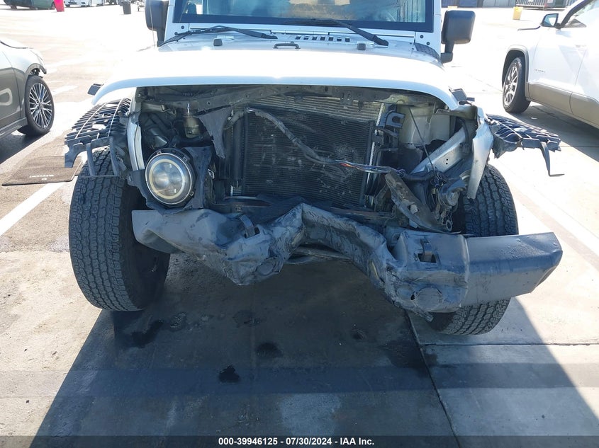 2007 Jeep Wrangler Unlimited Sahara VIN: 1J4GB59107L184215 Lot: 39946125