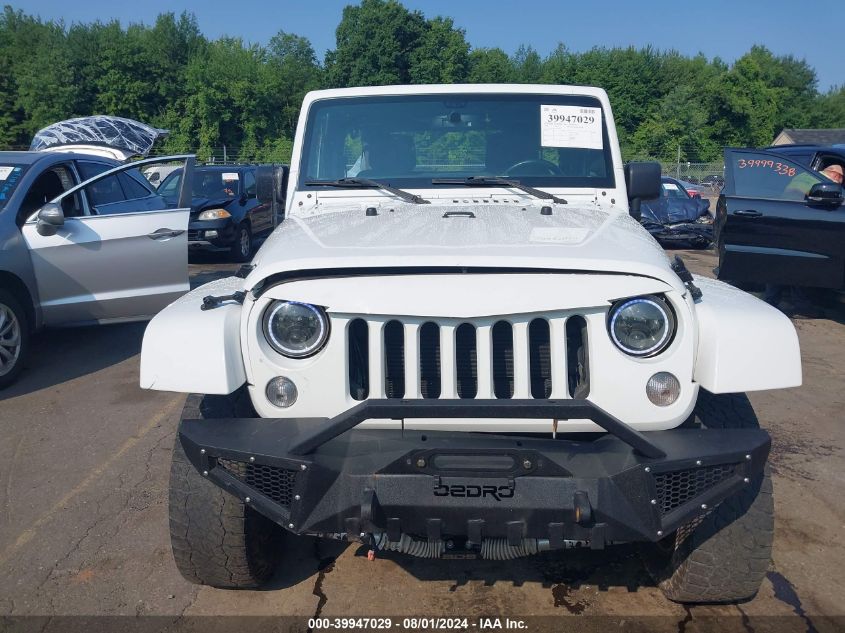 2015 Jeep Wrangler Unlimited Sahara VIN: 1C4BJWEGXFL689468 Lot: 39947029