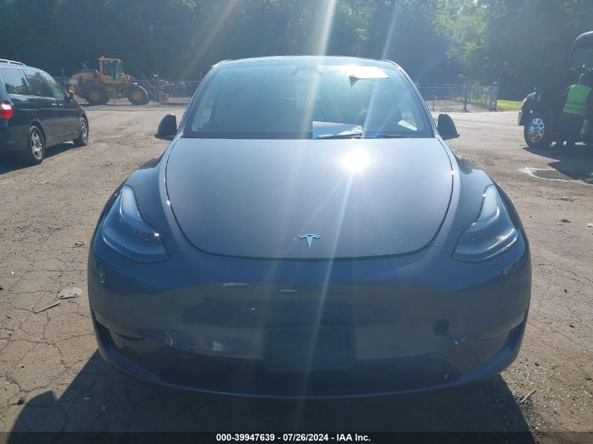 2023 Tesla Model Y Awd/Long Range Dual Motor All-Wheel Drive VIN: 7SAYGDEE0PA163317 Lot: 39947639