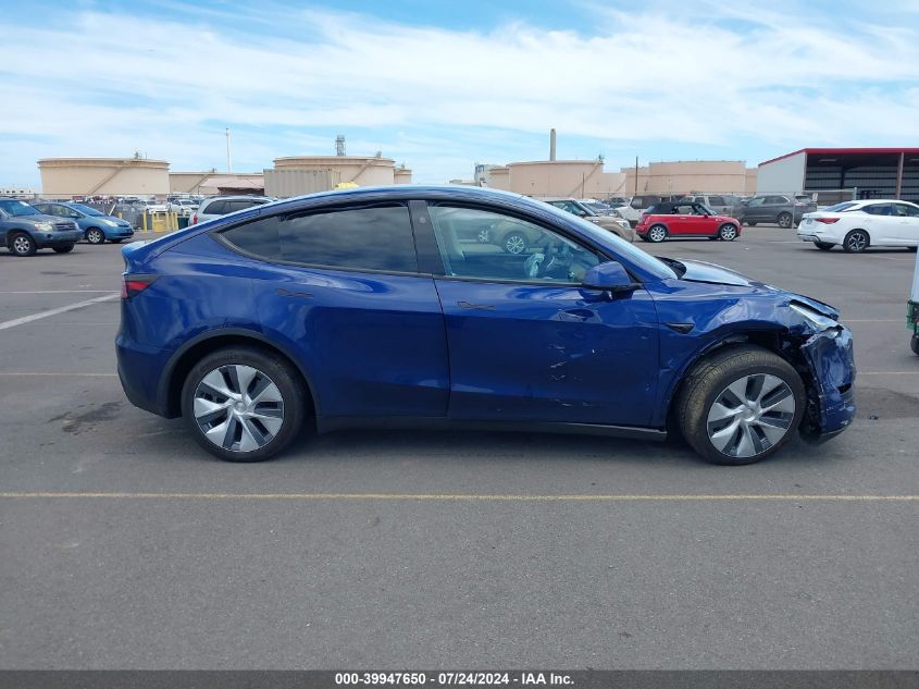 2023 Tesla Model Y Awd/Long Range Dual Motor All-Wheel Drive VIN: 7SAYGDEE7PA120562 Lot: 39947650