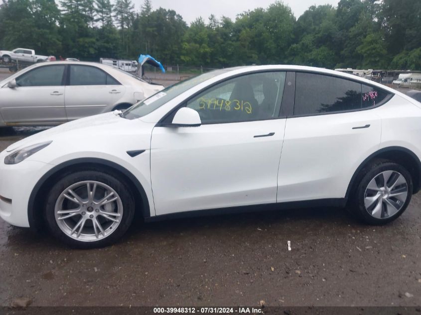 2023 Tesla Model Y Awd/Long Range Dual Motor All-Wheel Drive VIN: 7SAYGDEE2PA188882 Lot: 39948312