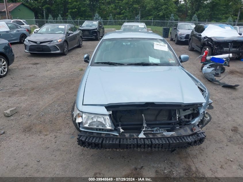 2003 Mercury Grand Marquis Gs VIN: 2MEFM74W33X693155 Lot: 39948649